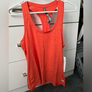 Vuori Lux Performance Tank in grapefruit heather